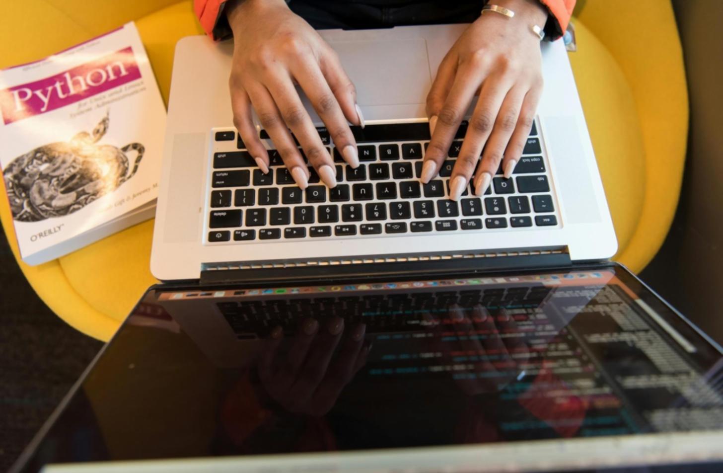 Mobile game development workspace showing modern development tools and creative process